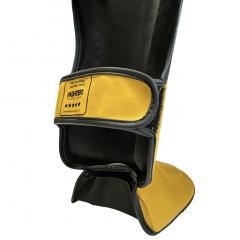 Osta Fighter Forever EVO Säärisuojat KELTA-MUSTA Thainyrkkeilykaupasta