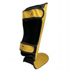 Osta Fighter Forever EVO Säärisuojat KELTA-MUSTA Thainyrkkeilykaupasta