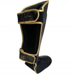 Osta Fighter Forever EVO Säärisuojat MUSTA-KULTA Thainyrkkeilykaupasta